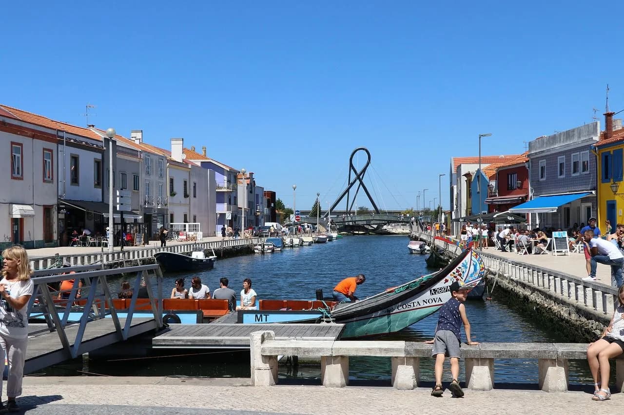 The canals of Aveiro, known as the "Venice of Portugal," are filled with colorful Moliceiro boats and are lined with traditional houses and cafes.