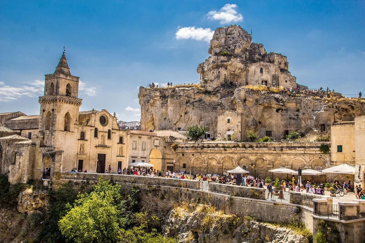 The magnificent Matera Cathedral, with its tall bell tower, is a centerpiece of the city's historic Sassi district.