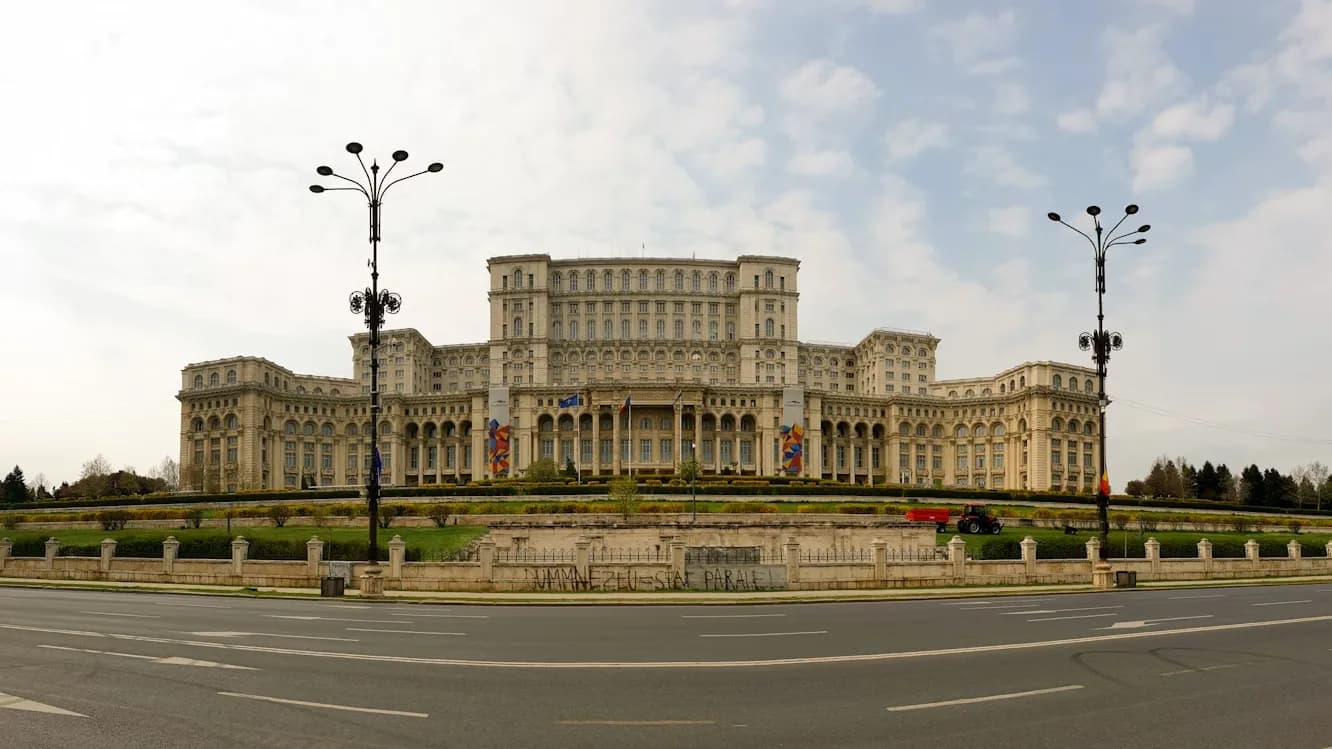 The monumental Palace of the Parliament, the second-largest administrative building in the world, dominates the skyline of Bucharest.