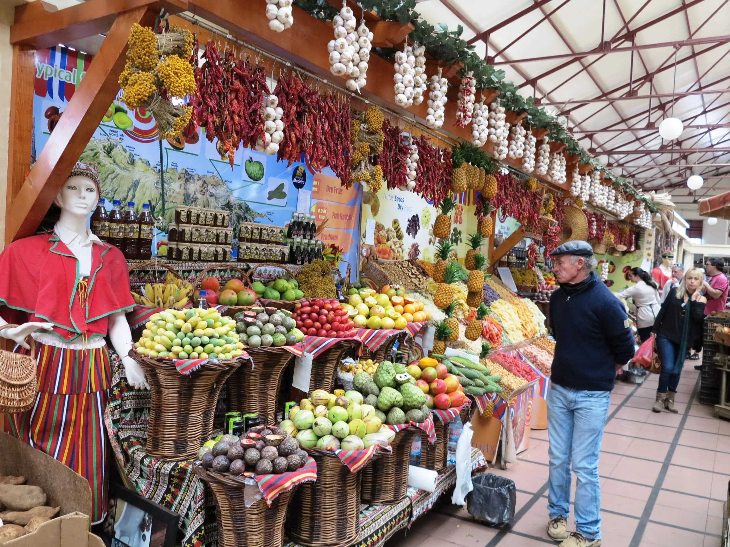The vibrant Mercado dos Lavradores, or Farmers' Market, is filled with stalls overflowing with colorful, exotic fruits and spices.