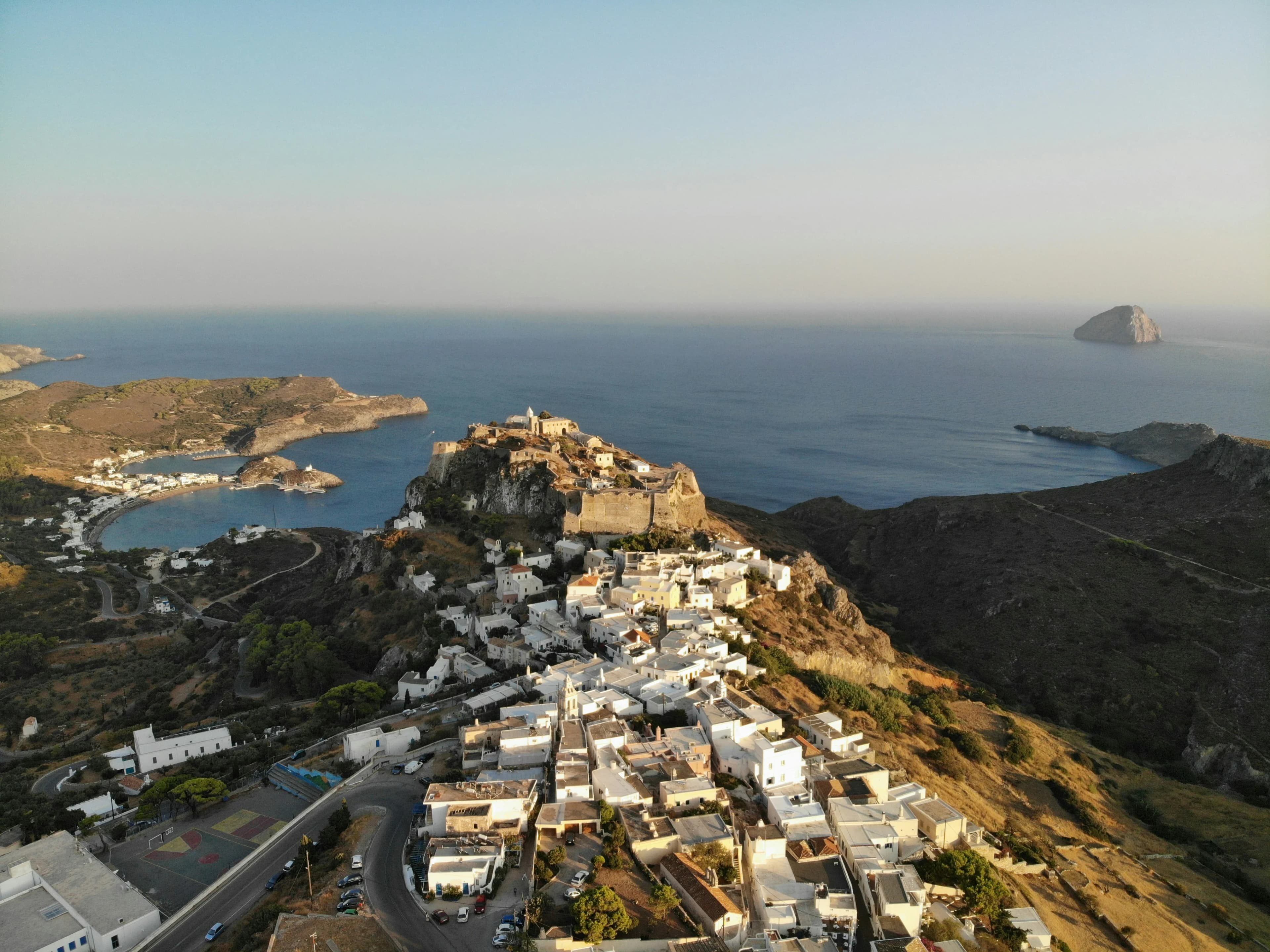 The traditional village of Kythira is built on a hillside, offering a stunning view of the bay and the distant sea.