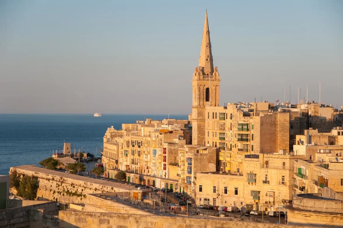 The historic Upper Barrakka Gardens offers a stunning panoramic view of the Grand Harbour and the fortified city of Valletta.